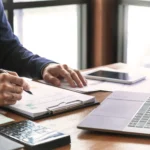 professional-reviewing-documents-in-office-setting-2026-01-11-09-00-50-utc